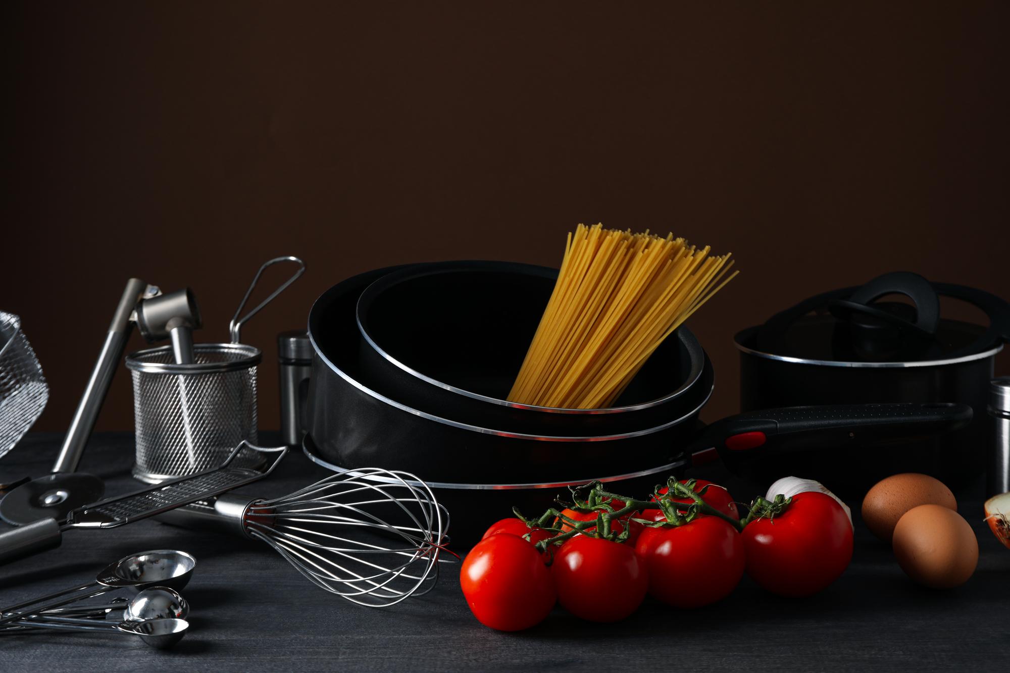 Modern kitchen workspace with ingredients and utensils